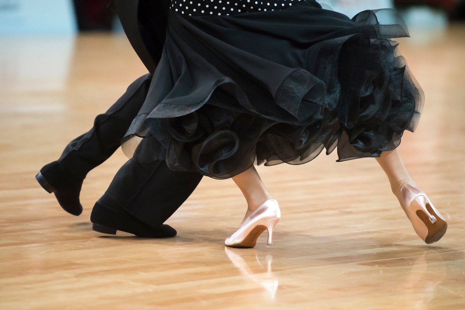 Couple Man and Woman Performing Ballroom Dance